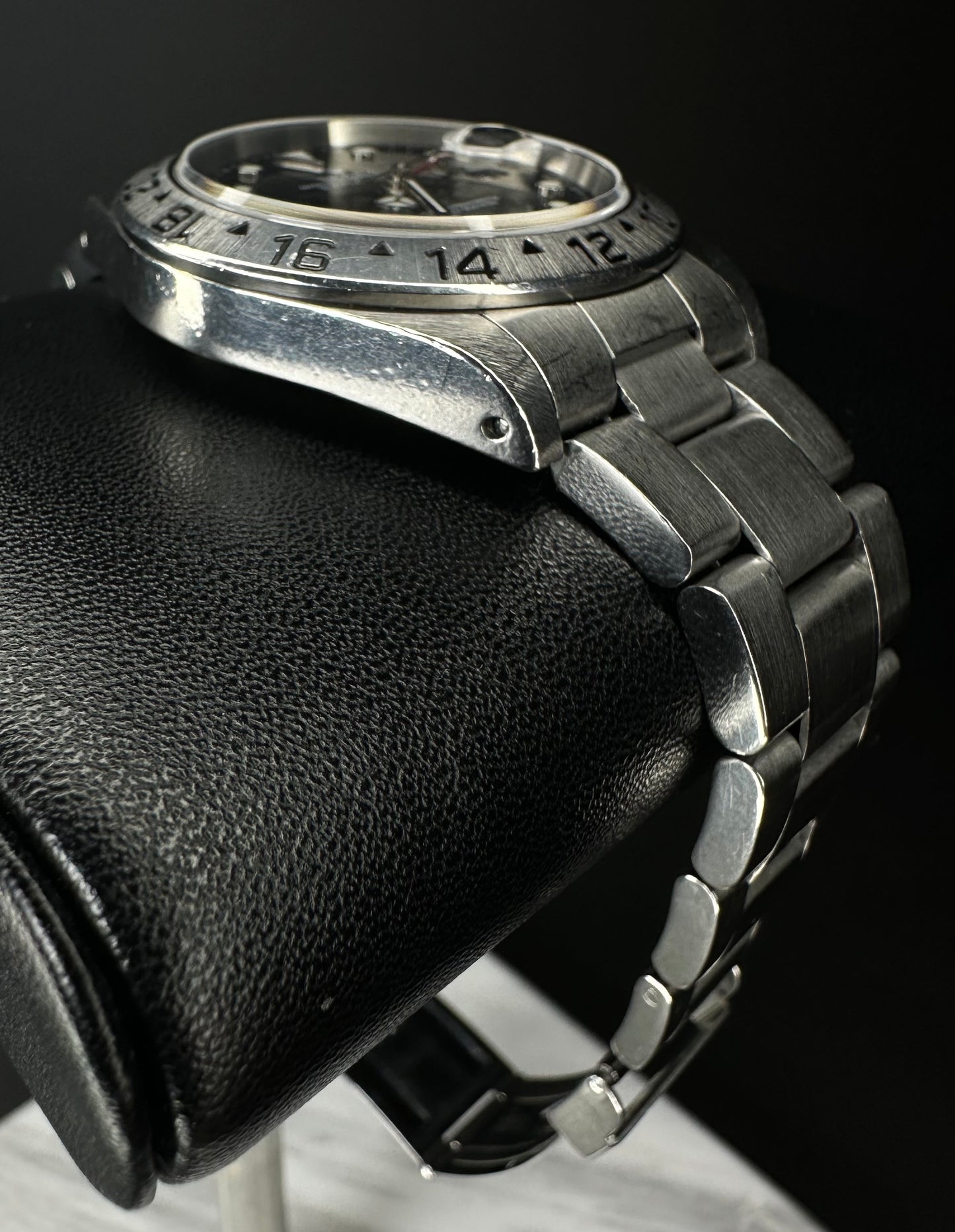 Rolex Explorer II 40mm automatic watch, model 16570, featuring a classic black dial and stainless steel case, 2000 release. This iconic timepiece combines durability and style, perfect for explorers and collectors seeking a reliable, versatile luxury watch. Available from The Watch Trader CT.