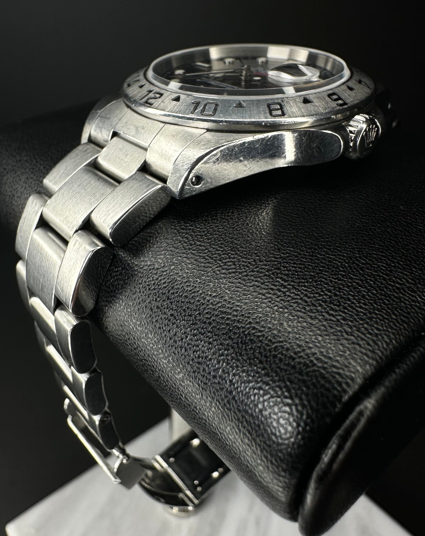 Rolex Explorer II 40mm automatic watch, model 16570, featuring a classic black dial and stainless steel case, 2000 release. This iconic timepiece combines durability and style, perfect for explorers and collectors seeking a reliable, versatile luxury watch. Available from The Watch Trader CT.