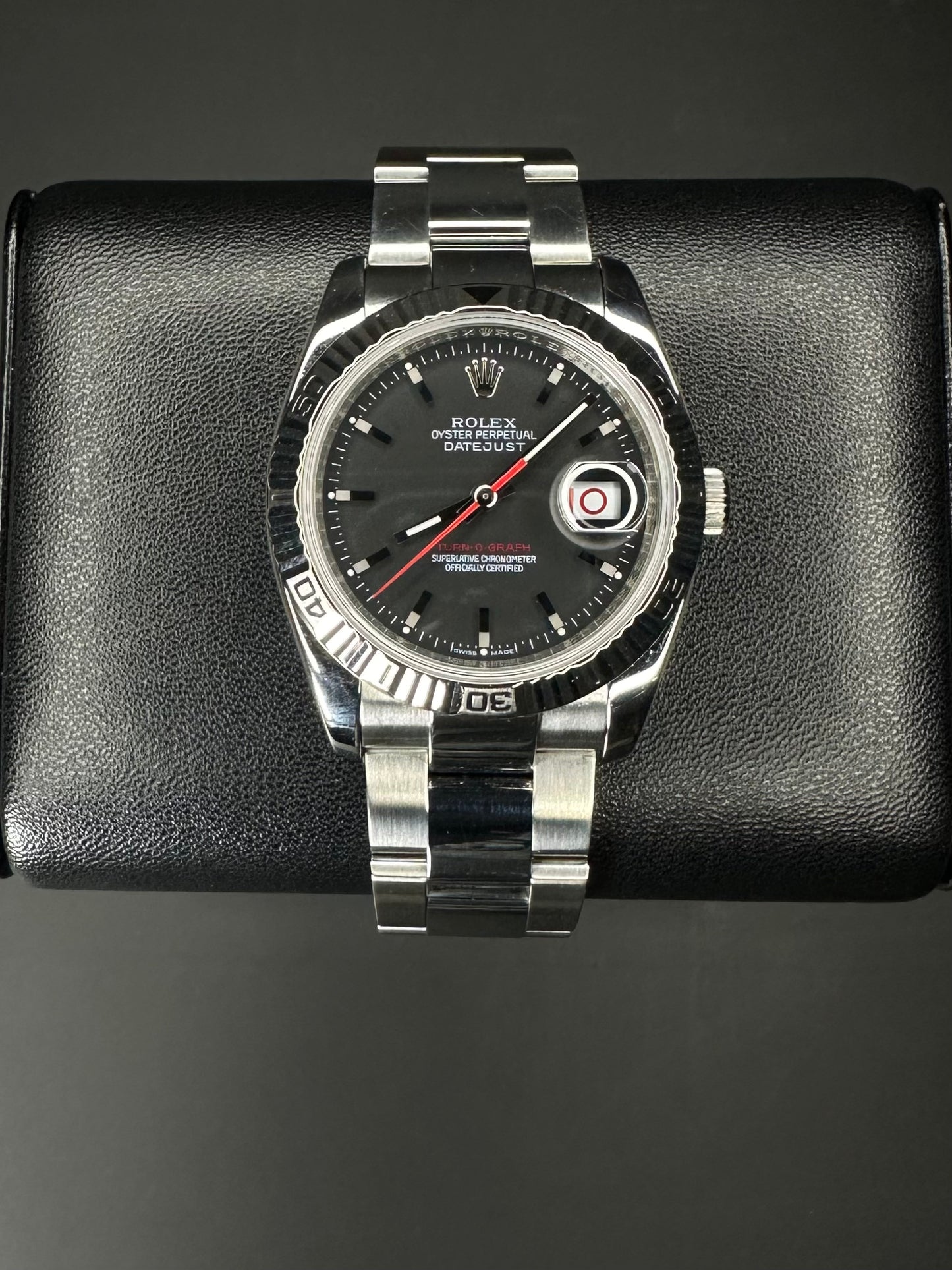 Rolex Datejust 36 Turn-O-Graph, model 116264, featuring a 36mm stainless steel case with a grey slate dial and signature rotating bezel, from 2008. This unique timepiece combines the classic Datejust design with sporty functionality, ideal for collectors and enthusiasts seeking a versatile luxury watch. Available from The Watch Trader in Madison, Connecticut.