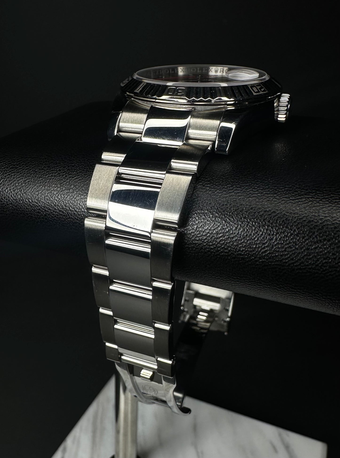 Rolex Datejust 36 Turn-O-Graph, model 116264, featuring a 36mm stainless steel case with a grey slate dial and signature rotating bezel, from 2008. This unique timepiece combines the classic Datejust design with sporty functionality, ideal for collectors and enthusiasts seeking a versatile luxury watch. Available from The Watch Trader in Madison, Connecticut.