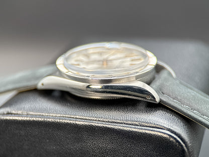 Rolex Date 15010 Silver Dial Engine-Turned Bezel Steel 34mm Automatic Watch3